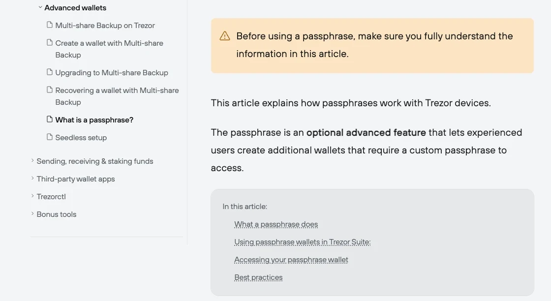 Trezor 知识库英文页 What is a passphrase 的截图:顶部黄底警示提醒使用 passphrase 前先完全读懂本文,正文写着 passphrase 是可选的高级功能,让有经验的用户创建需要自定义口令才能打开的额外钱包,左侧是高级钱包栏目目录
